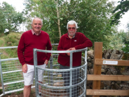 Richmond Rotarians Jos Huddleston (left) and Colin Grant (right) with one of the recently installed gates on path to Willance’s Leap near Richmond
